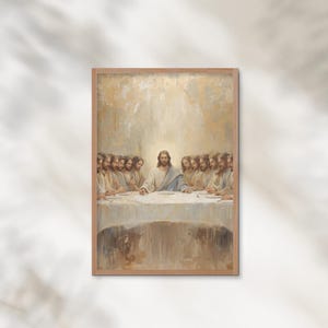 May include: A framed print of the Last Supper, featuring Jesus and his disciples seated at a table. The artwork has a warm, neutral color palette with soft lighting and a classic, religious theme.
