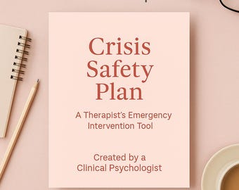 May include: A light pink book titled "Crisis Safety Plan" with red text. The book is a therapist's emergency intervention tool, created by a clinical psychologist. A notepad, pencil, and a cup of coffee are also visible.