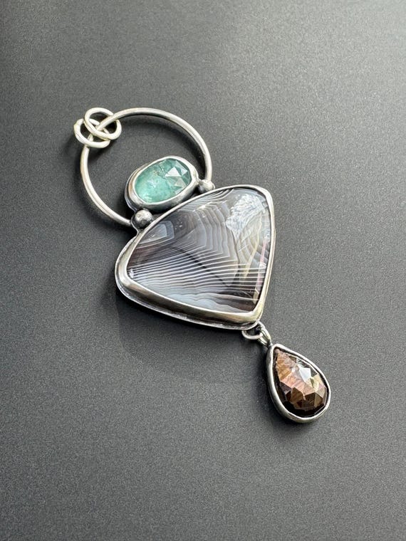 Botswana agate pendant with paraiba kyanite and chocolate moonstone