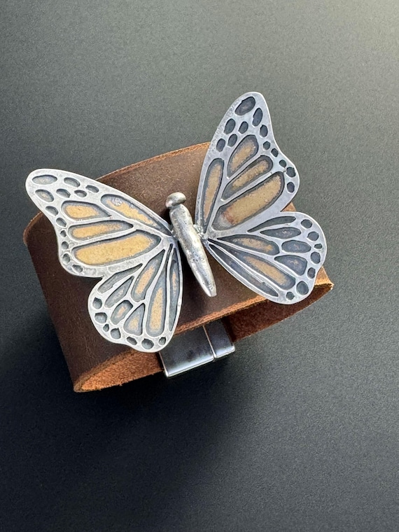 Hand forged butterfly on leather cuff