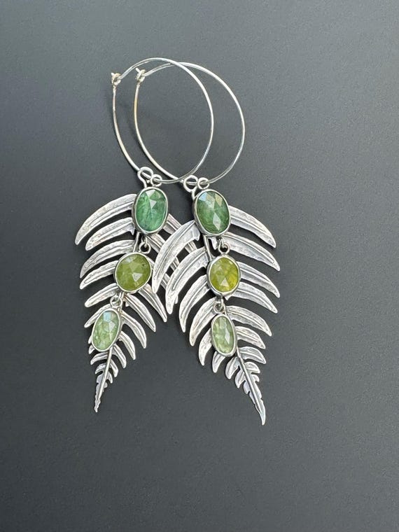 Hand Fabricated fern earrings with kyanite and vesuvianite