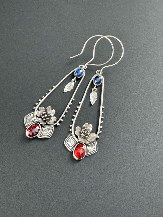 Handmade dogwood blossom earrings with kyanite and garnet