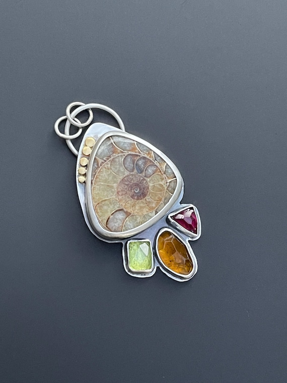Ammonite pendant with tourmaline and 22k acents