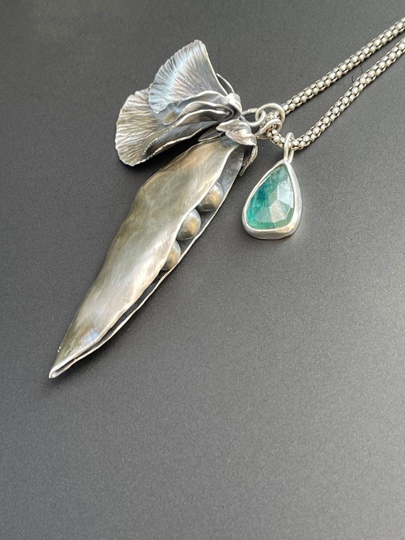 Hand fabricated peapod, sweet pea flower and kyanite pendant