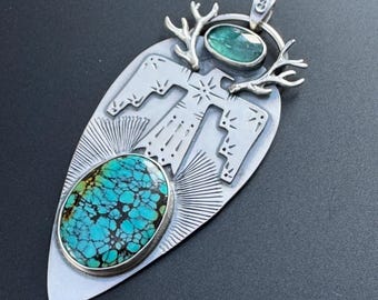 Thunderbird pendant with turquoise and kyanite