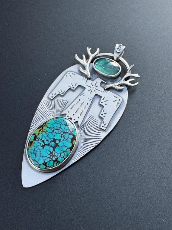 Thunderbird pendant with turquoise and kyanite
