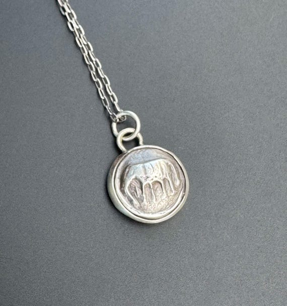 Silver elephant charm pendant