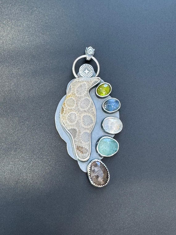 Raven with gemstones pendant