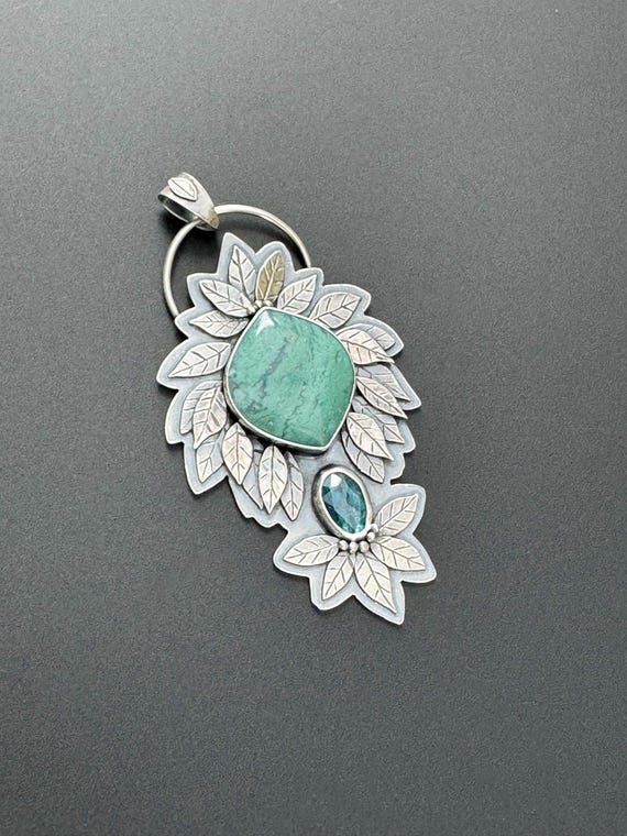 Mtorolite pendant with teal kyanite and handmade leaves