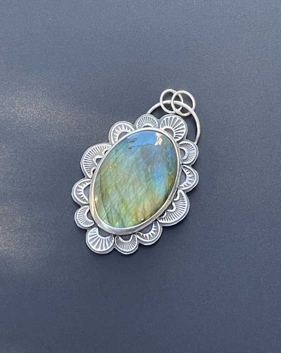 Labradorite pendant with stamped accents