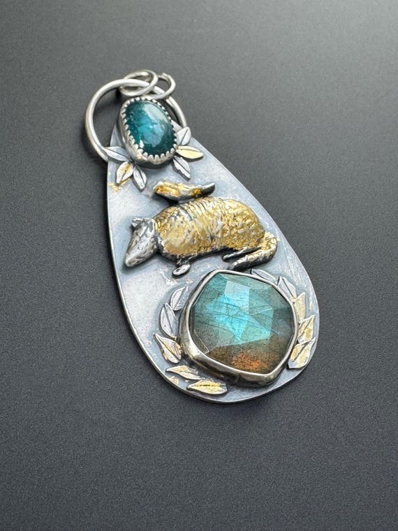 Annabelle and the armadillo pendant