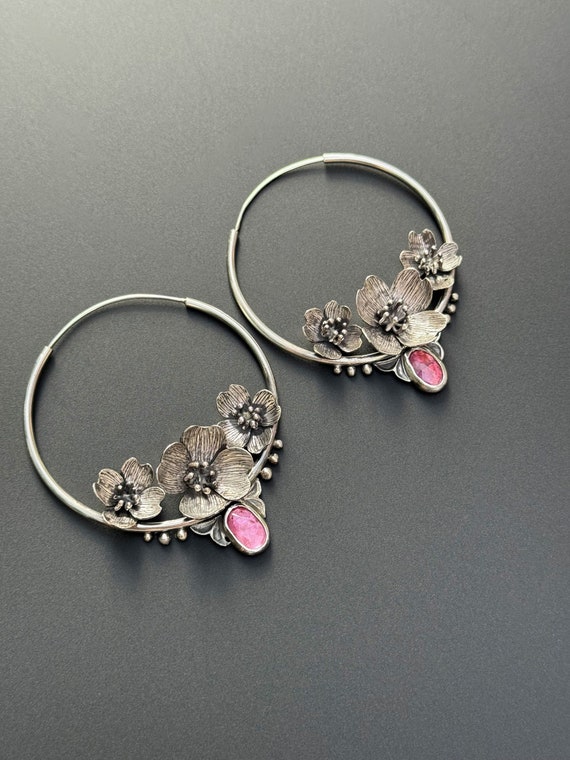 Handmade dogwood blossom hoop earrings with pink sapphires