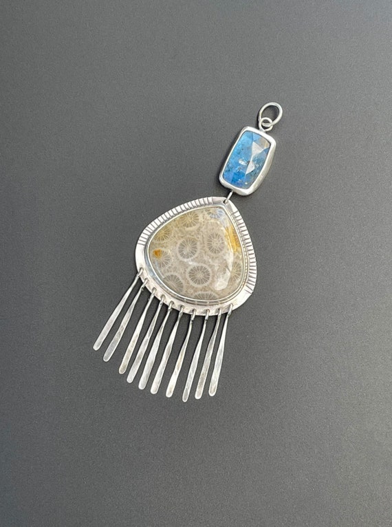 Kyanite with fossilized coral pendant
