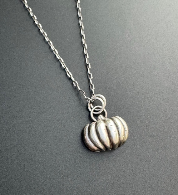 Silver pumpkin charm pendant