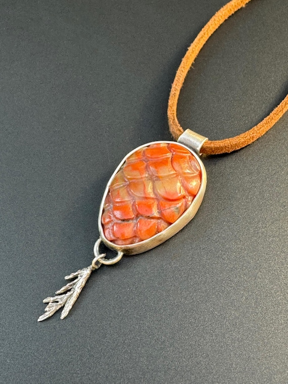 Petrified wood carved pinecone pendant