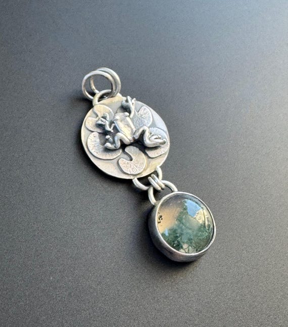 Frog on lily pads with moss agate pendant