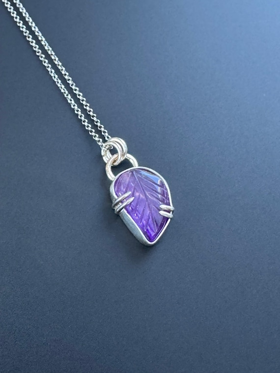Carved amethyst leaf pendant