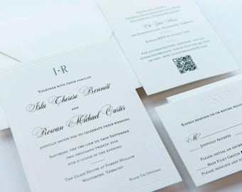 May include: Elegant white wedding invitation suite with a classic design. The invitation features the names Isla Cherese Bennett and Rowan Michael Carter, along with wedding details. Includes an RSVP card and a details card with a QR code.
