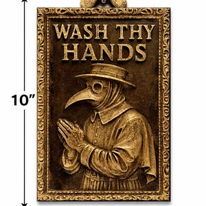 May include: A rectangular, gold-colored wall plaque, 6 inches wide and 10 inches tall, featuring a relief of a plague doctor. The plaque has the words "WASH THY HANDS" at the top. The doctor is wearing a hat and a long-beaked mask, with hands clasped in prayer.