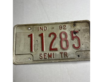 Semirremolque clásico de Indiana, matrícula de 1992, estilo "cueva del hombre"