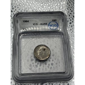May include: A 1964 silver dime in a clear plastic case. The case is labelled with "1964", "ICG - AU55", and "10C", along with the ICG logo. The coin is positioned centrally within the protective holder.
