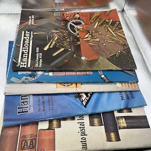 Lote de 5 cargadores manuales vintage de los años 70 para pistolas automáticas y campos de tiro.