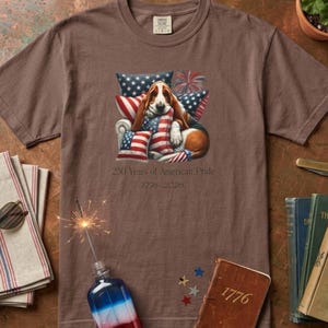 Basset hound patriotic shirt in espresso brown with vintage Americana props sparkler and 1776 book styling.