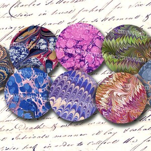 May include: Eight round, colorful, marbled paper designs. Each design features a unique swirling pattern of blue, pink, green, purple, and gold.