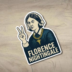 May include: A sticker depicting Florence Nightingale in a vintage style, giving a peace sign. She is dressed in a blue gown, a white lace cap, and a gold chain with a medical emblem. The text "FLORENCE NIGHTINGALE" is displayed below.