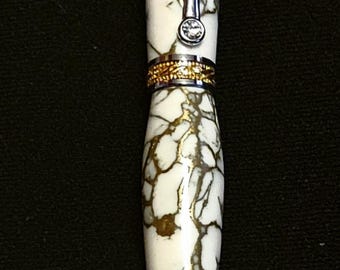 Majestic Rollerball Pen Chrome and 22kt Gold-Plated white Trusone with Gold matrix.