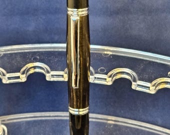 Gold Gatsby Click made with West African Ebony