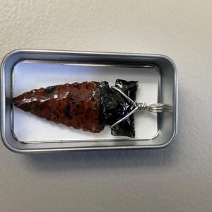 Wire wrapped obsidian arrowhead pendant.  Native inspired.
