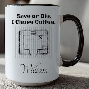 May include: White coffee mug with a black handle and rim. The mug features the text "Save or Die. I Chose Coffee." above a black and white blueprint design. The name "William" is printed in cursive below the blueprint.