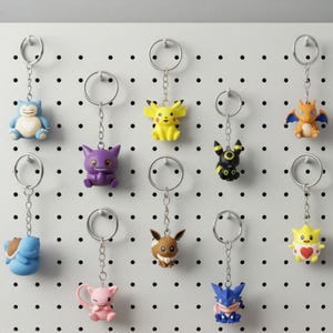 3D Printed Pocket Monster Keychains & Pokeballs: Snorlax, Pikachu, Eevee, Umbreon, Greninja, Togepi, Mew, Gengar, Squirtle, Charizard