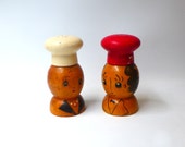 Vintage mid century kitsch painted wood chef salt and pepper shakers .