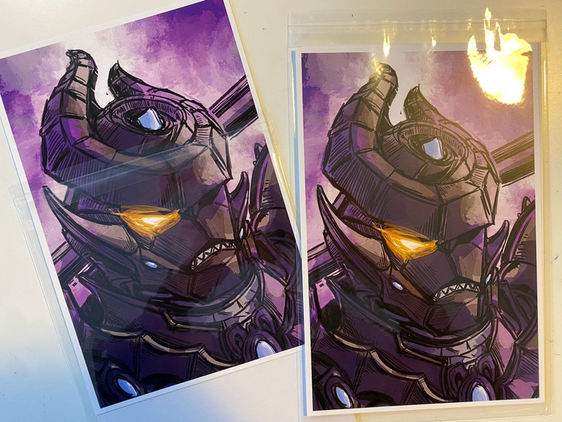 May include: A purple and black illustration of a robot with a single glowing yellow eye. The robot has a large, detailed helmet with horns and a sharp jaw.