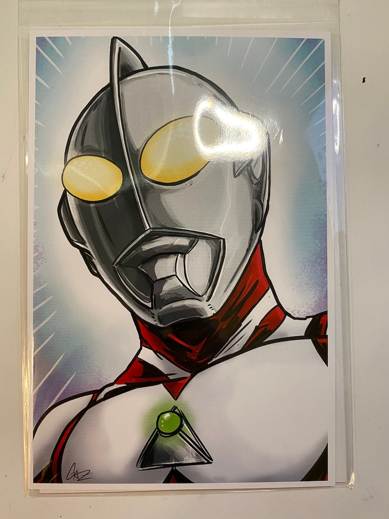 May include: A black and white illustration of a superhero with a red and white suit. The superhero has a silver helmet with a green gem on the chest. The background is a blue and white gradient.
