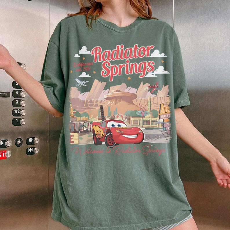 May include: A set of three ceramic mugs with a speckled, matte finish. The mugs are in shades of cream, light gray, and dark gray. Each mug has a simple, minimalist design and a rounded handle.