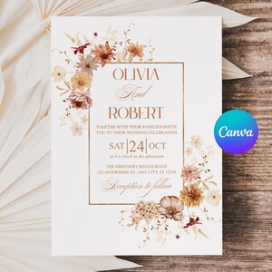 Może przedstawiać: Zaproszenie ślubne z imionami "Olivia i Robert" w złotej ramce, ozdobione aranżacjami kwiatowymi w odcieniach brązu, kremu i bordo. Data to 24 października. Widoczne logo Canva. Neutralne tło.