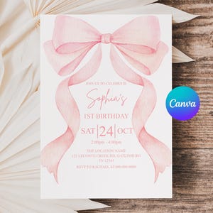 May include: A pink watercolor birthday invitation with a large bow and flowing ribbons. The invitation reads "Sophia's 1st Birthday" and includes the date, time, and location. The Canva logo is visible in the corner.