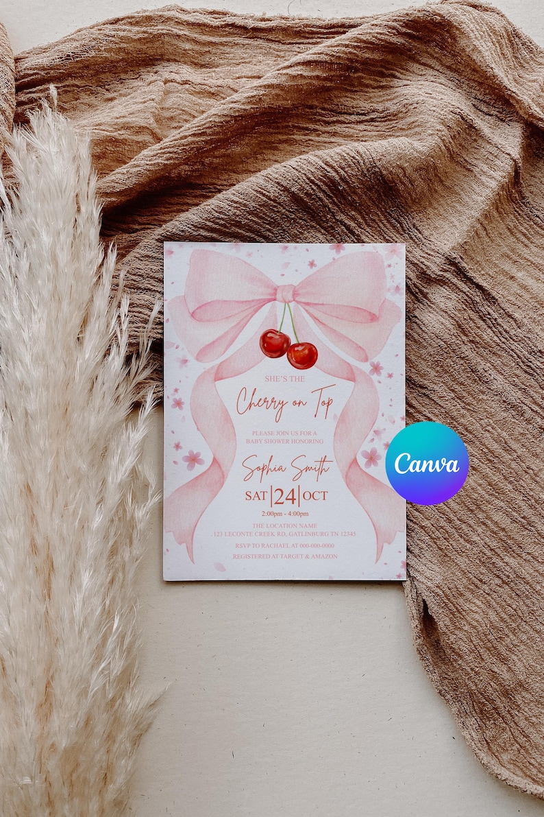 May include: A baby shower invitation with a pink bow and cherries design. The text "She's the Cherry on Top" is displayed, along with the name "Sophia Smith" and event details. The invitation is on a white background.
