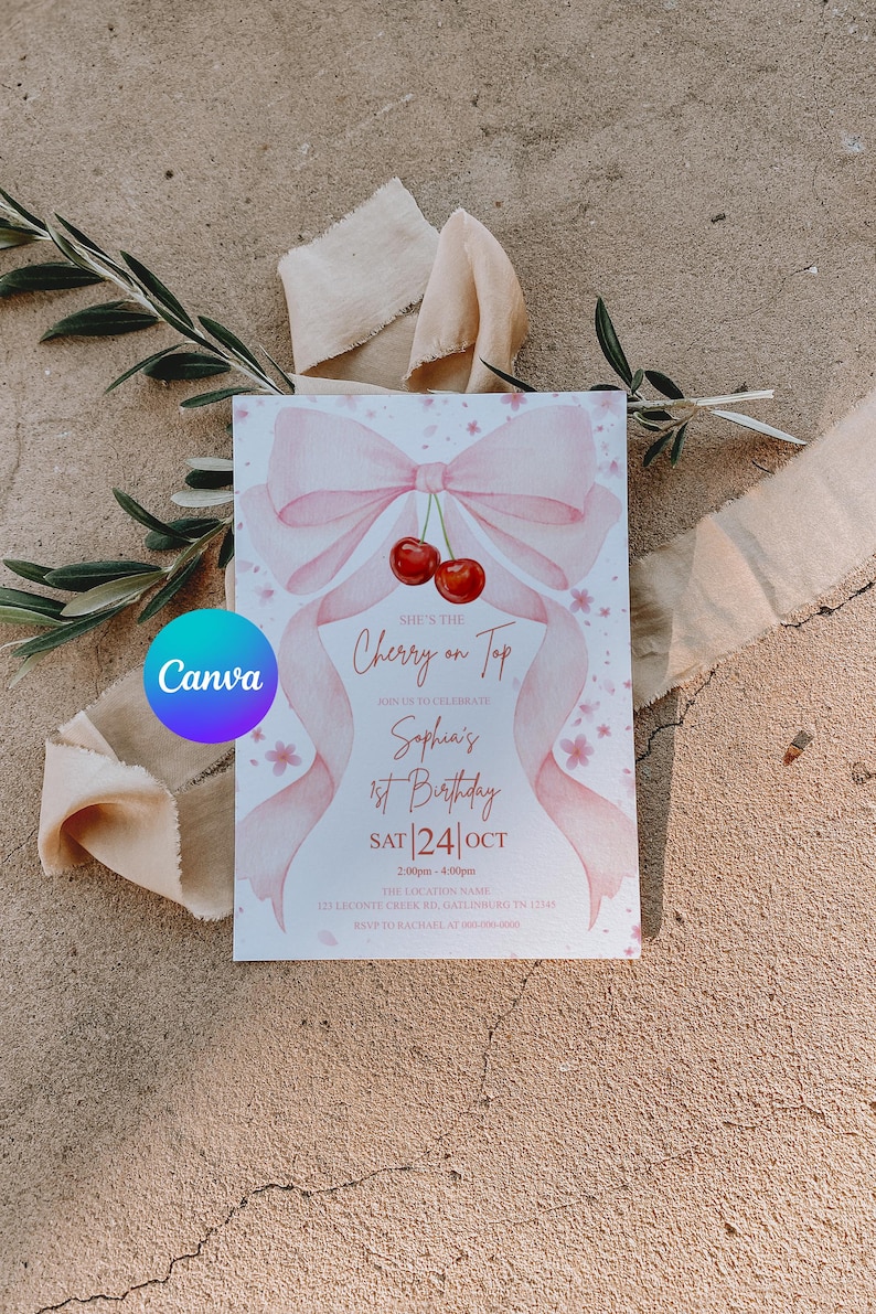 May include: A pink invitation card with a bow and cherry design. The text reads "She's the Cherry on Top" and announces Sophia's 1st Birthday on Saturday, October 24th. The card is decorated with pink floral accents.