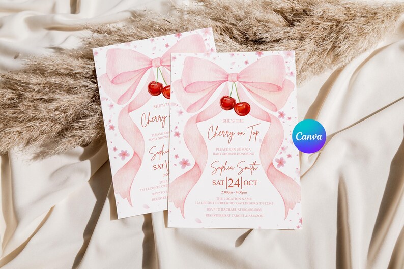 May include: Two baby shower invitations with a watercolor design. Each card features a pink bow, cherries, and the text "She's the Cherry on Top". The invitations include event details.