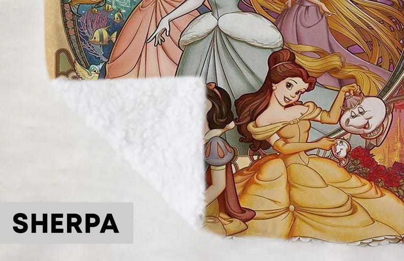 May include: Sherpa blanket featuring a colorful illustration of Disney princesses. Belle is in the foreground, wearing a yellow gown and holding a purse. Other princesses are also depicted. The blanket has a soft, white texture.