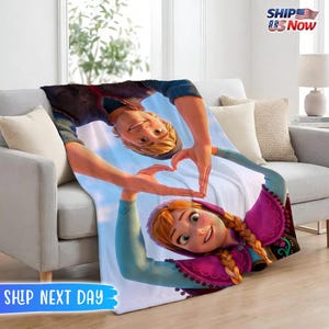 May include: A rustic wooden sign with the text "Welcome" in a handwritten style. The sign is painted white with a distressed finish, and features a decorative floral element. The background is a blurred image of a home.