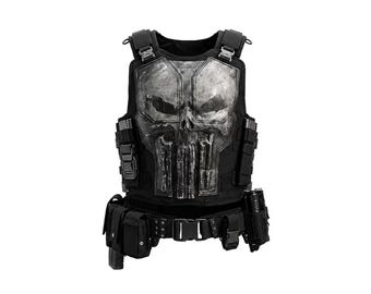 May include: A black tactical vest featuring a prominent, weathered silver skull emblem on the chest. The vest includes adjustable shoulder straps with metal buckles, side webbing, and a utility belt equipped with multiple pouches and holsters.