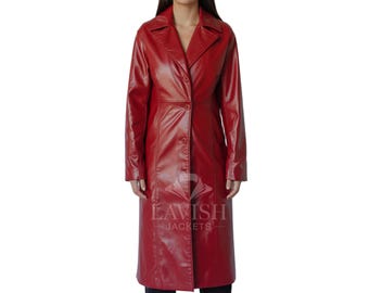 May include: A long, red, faux leather coat with a button-up front and a notched collar. The coat is knee-length and has long sleeves. The text "LAVISH JACKETS" is printed on the lower part of the coat.