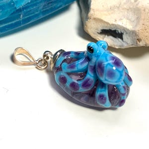 Turquoise and purple reticulated octopus lampwork glass pendant with sterling silver bail