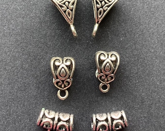 6 antique silver-plated “Tibetan”-style bails. 2 each of 3 designs