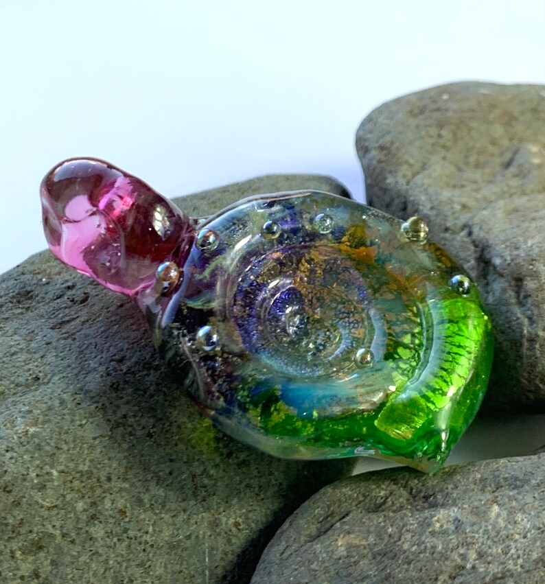 Large sparkling purple green and gold glass ammonite lampwork pendant